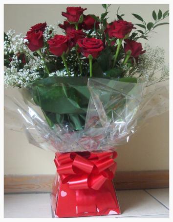 Red roses handtied Aqua pack from £30